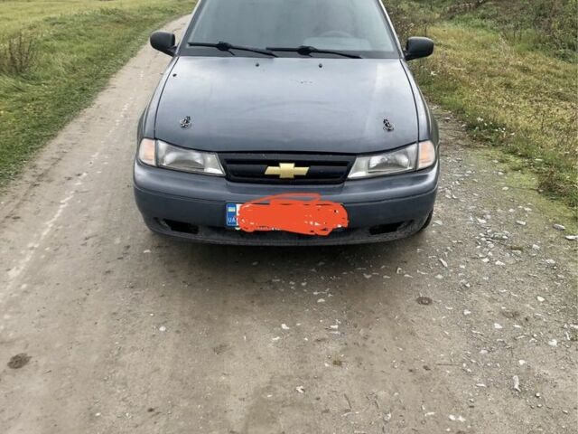 Сірий Деу Нексія, об'ємом двигуна 1.5 л та пробігом 30 тис. км за 1400 $, фото 1 на Automoto.ua