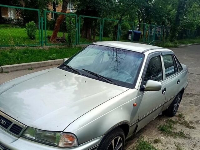 Сірий Деу Нексія, об'ємом двигуна 1.5 л та пробігом 227 тис. км за 1350 $, фото 1 на Automoto.ua