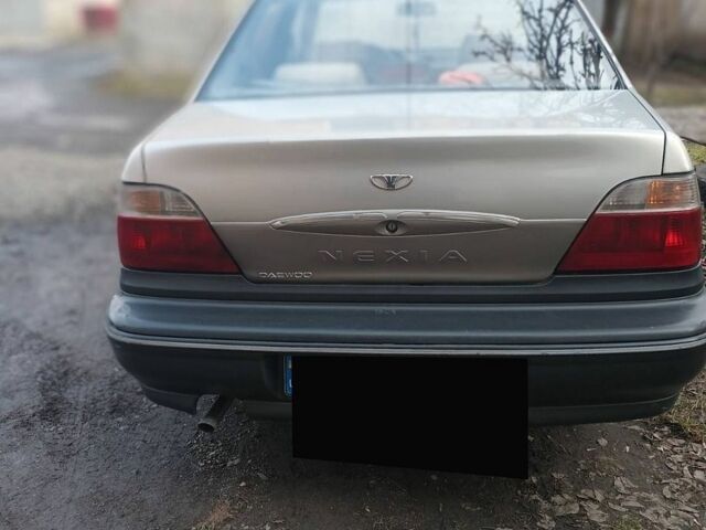 Серый Дэу Нексия, объемом двигателя 1.5 л и пробегом 245 тыс. км за 1300 $, фото 1 на Automoto.ua