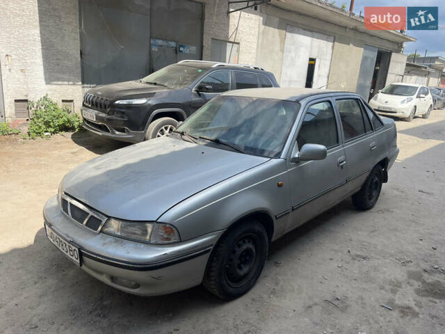 Серый Дэу Нексия, объемом двигателя 1.6 л и пробегом 295 тыс. км за 450 $, фото 1 на Automoto.ua