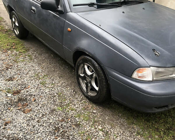 Серый Дэу Нексия, объемом двигателя 1.5 л и пробегом 30 тыс. км за 1400 $, фото 1 на Automoto.ua