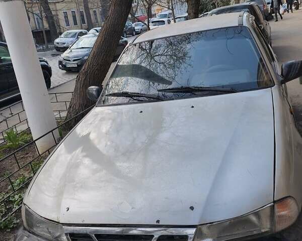 Серый Дэу Нексия, объемом двигателя 1.5 л и пробегом 300 тыс. км за 1300 $, фото 1 на Automoto.ua