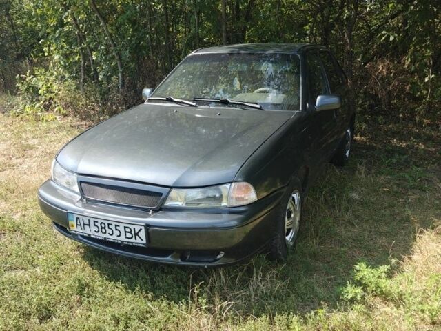 Сірий Деу Нексія, об'ємом двигуна 1.5 л та пробігом 395 тис. км за 1099 $, фото 1 на Automoto.ua