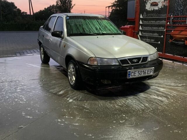 Сірий Деу Нексія, об'ємом двигуна 1.5 л та пробігом 150 тис. км за 1299 $, фото 1 на Automoto.ua