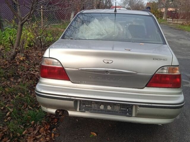 Сірий Деу Нексія, об'ємом двигуна 1 л та пробігом 288 тис. км за 355 $, фото 1 на Automoto.ua