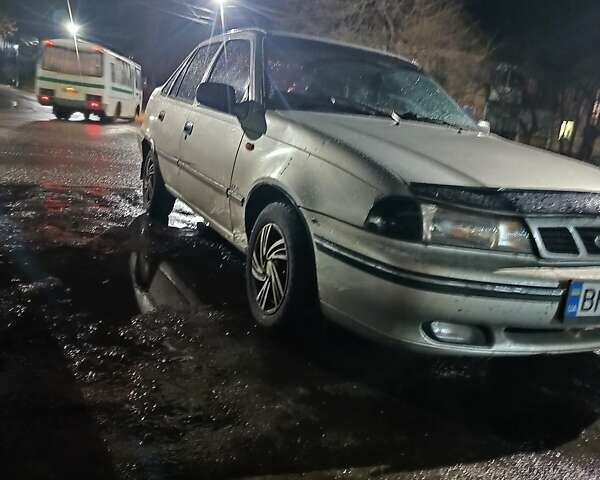 Сірий Деу Нексія, об'ємом двигуна 1.5 л та пробігом 250 тис. км за 1600 $, фото 1 на Automoto.ua