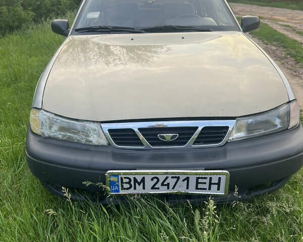 Сірий Деу Нексія, об'ємом двигуна 1.5 л та пробігом 125 тис. км за 1690 $, фото 1 на Automoto.ua