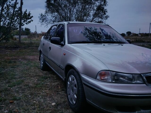 Сірий Деу Нексія, об'ємом двигуна 1 л та пробігом 192 тис. км за 1631 $, фото 1 на Automoto.ua