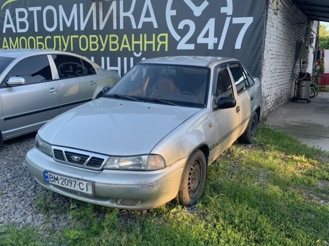 Сірий Деу Нексія, об'ємом двигуна 1.5 л та пробігом 100 тис. км за 1125 $, фото 1 на Automoto.ua