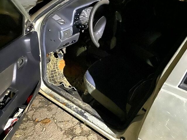 Сірий Деу Нексія, об'ємом двигуна 1.5 л та пробігом 350 тис. км за 1000 $, фото 1 на Automoto.ua
