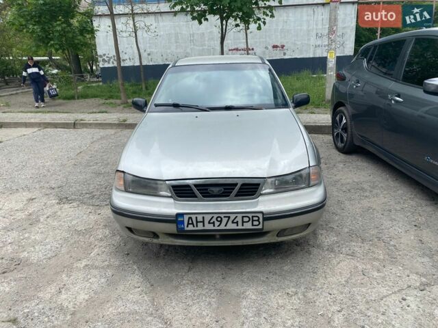 Сірий Деу Нексія, об'ємом двигуна 1.5 л та пробігом 232 тис. км за 1300 $, фото 1 на Automoto.ua