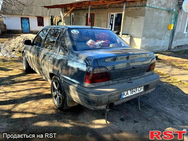 Серый Дэу Нексия, объемом двигателя 1.5 л и пробегом 160 тыс. км за 1550 $, фото 1 на Automoto.ua