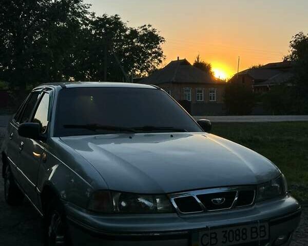 Серый Дэу Нексия, объемом двигателя 1.5 л и пробегом 248 тыс. км за 1800 $, фото 1 на Automoto.ua