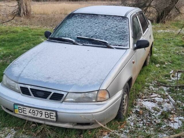 Сірий Деу Нексія, об'ємом двигуна 1.5 л та пробігом 267 тис. км за 710 $, фото 1 на Automoto.ua