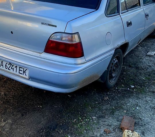 Серый Дэу Нексия, объемом двигателя 15 л и пробегом 305 тыс. км за 799 $, фото 1 на Automoto.ua