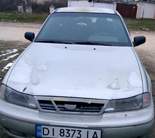 Сірий Деу Нексія, об'ємом двигуна 1.5 л та пробігом 31800 тис. км за 1300 $, фото 1 на Automoto.ua