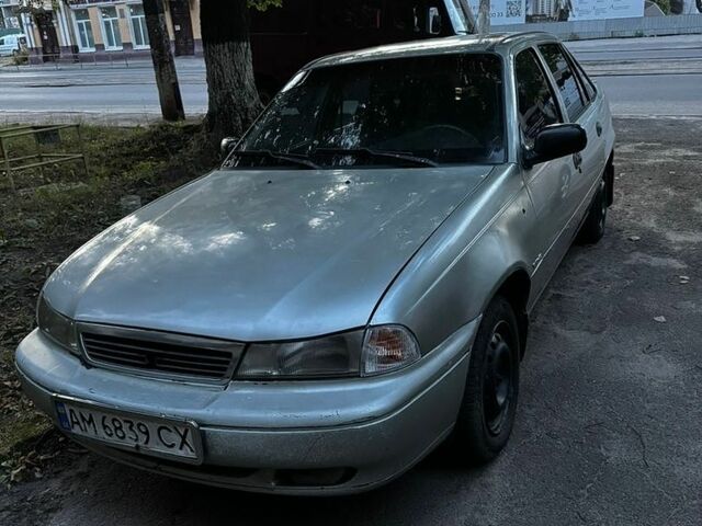 Сірий Деу Нексія, об'ємом двигуна 1.5 л та пробігом 256 тис. км за 1500 $, фото 1 на Automoto.ua