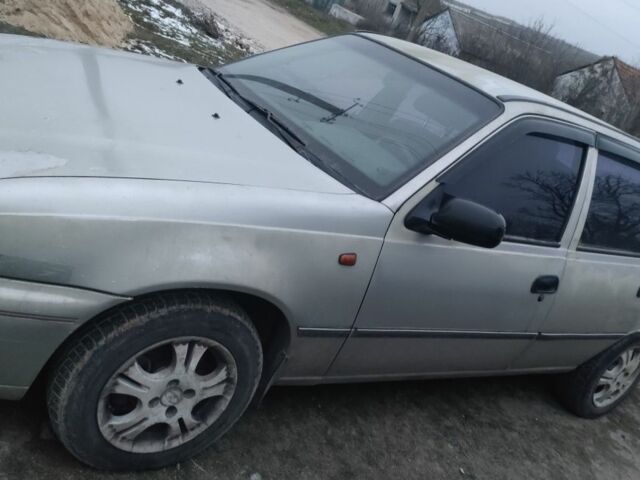 Серый Дэу Нексия, объемом двигателя 1.5 л и пробегом 318 тыс. км за 1300 $, фото 1 на Automoto.ua