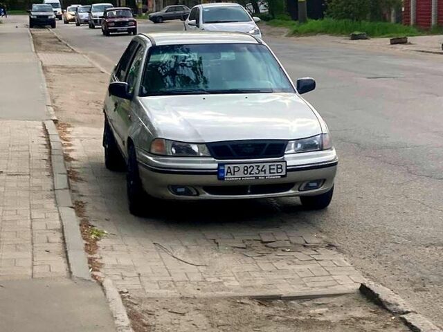 Серый Дэу Нексия, объемом двигателя 1.5 л и пробегом 187 тыс. км за 2100 $, фото 1 на Automoto.ua