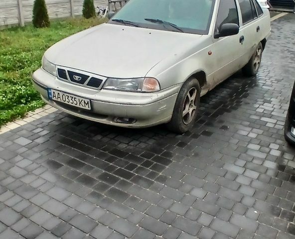 Сірий Деу Нексія, об'ємом двигуна 1.5 л та пробігом 249 тис. км за 714 $, фото 1 на Automoto.ua