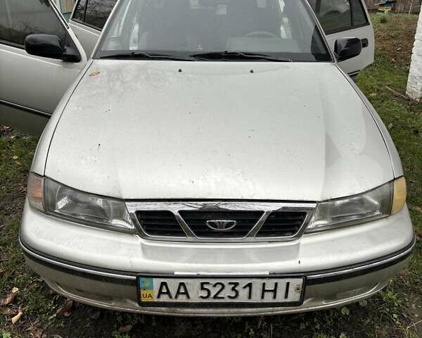 Сірий Деу Нексія, об'ємом двигуна 1.5 л та пробігом 246 тис. км за 2350 $, фото 1 на Automoto.ua