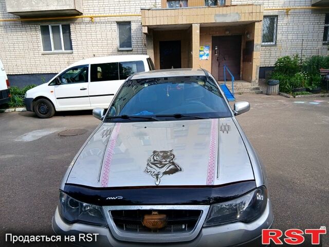 Сірий Деу Нексія, об'ємом двигуна 1.5 л та пробігом 257 тис. км за 1600 $, фото 1 на Automoto.ua