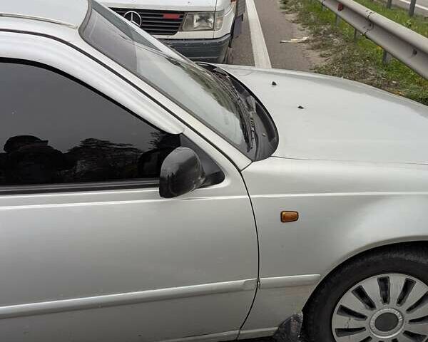 Сірий Деу Нексія, об'ємом двигуна 1.6 л та пробігом 315 тис. км за 600 $, фото 1 на Automoto.ua