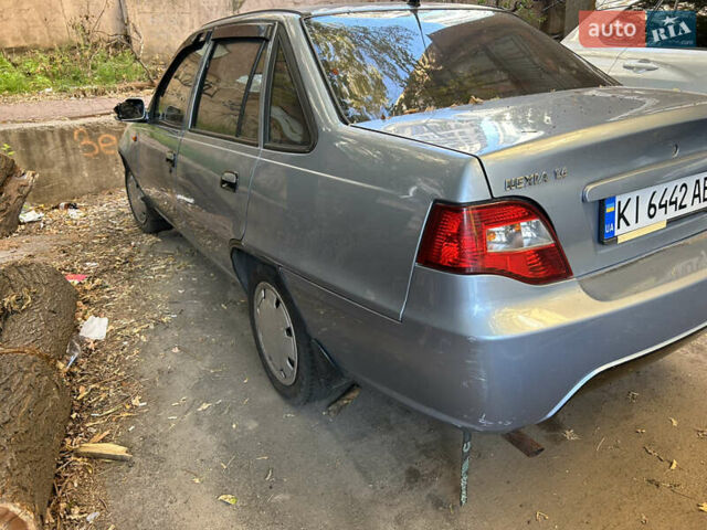 Сірий Деу Нексія, об'ємом двигуна 1.6 л та пробігом 136 тис. км за 900 $, фото 1 на Automoto.ua