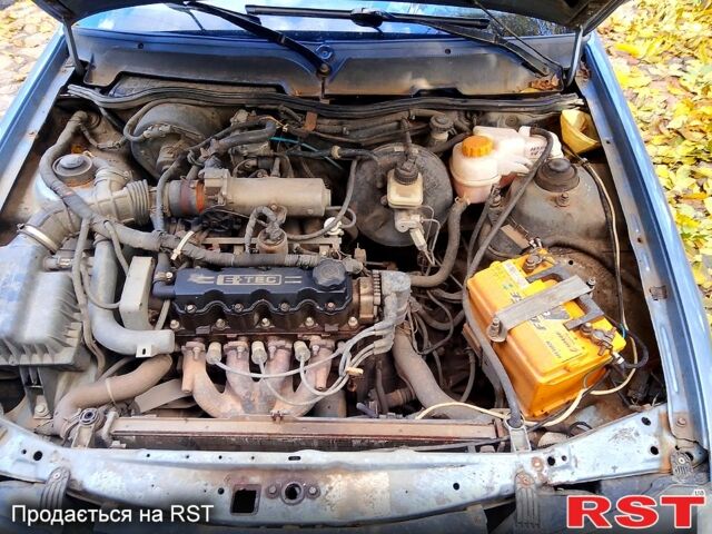 Сірий Деу Нексія, об'ємом двигуна 1.5 л та пробігом 487 тис. км за 1000 $, фото 1 на Automoto.ua