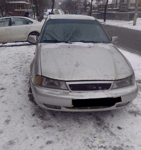 Сірий Деу Нексія, об'ємом двигуна 1.5 л та пробігом 130 тис. км за 2000 $, фото 1 на Automoto.ua