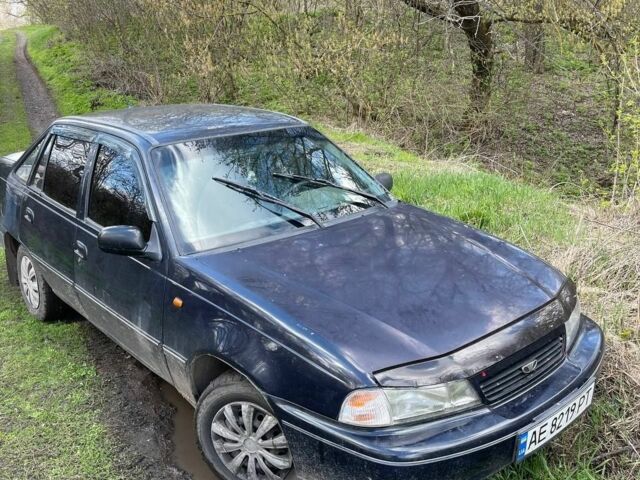 Синій Деу Нексія, об'ємом двигуна 1.5 л та пробігом 206 тис. км за 674 $, фото 1 на Automoto.ua