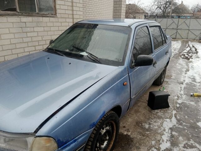 Синий Дэу Нексия, объемом двигателя 1.5 л и пробегом 218 тыс. км за 600 $, фото 1 на Automoto.ua