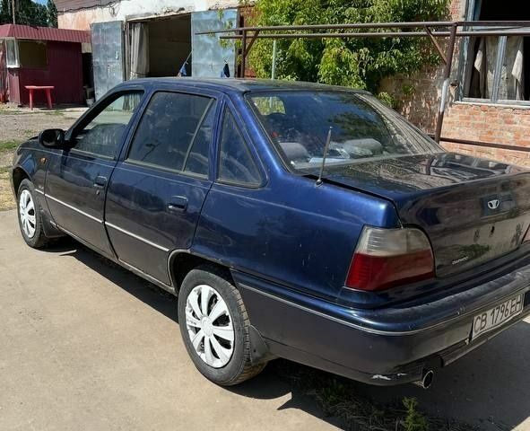 Синий Дэу Нексия, объемом двигателя 1.5 л и пробегом 300 тыс. км за 850 $, фото 1 на Automoto.ua