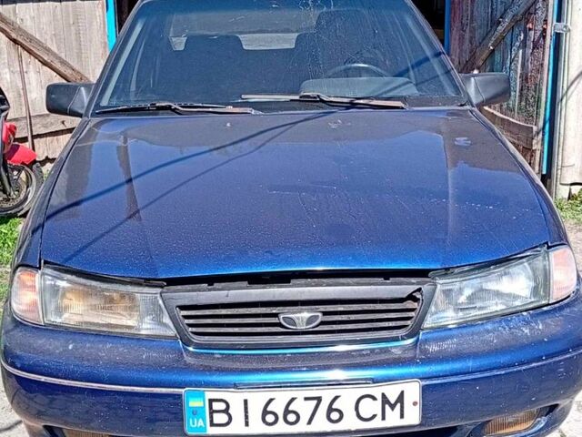 Синій Деу Нексія, об'ємом двигуна 1.5 л та пробігом 111 тис. км за 1400 $, фото 1 на Automoto.ua