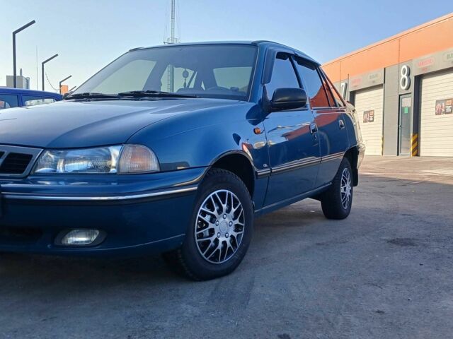 Синій Деу Нексія, об'ємом двигуна 1.5 л та пробігом 80 тис. км за 2400 $, фото 1 на Automoto.ua