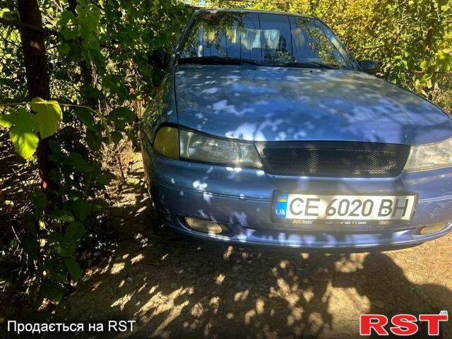 Синій Деу Нексія, об'ємом двигуна 1.5 л та пробігом 200 тис. км за 1500 $, фото 1 на Automoto.ua