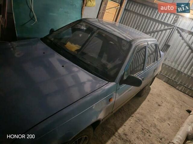 Синий Дэу Нексия, объемом двигателя 1.5 л и пробегом 158 тыс. км за 1700 $, фото 1 на Automoto.ua