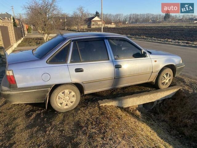 Синій Деу Нексія, об'ємом двигуна 1.5 л та пробігом 150 тис. км за 1950 $, фото 1 на Automoto.ua