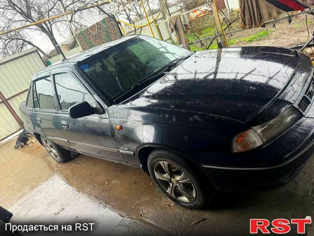 Синій Деу Нексія, об'ємом двигуна 1.5 л та пробігом 200 тис. км за 1000 $, фото 1 на Automoto.ua