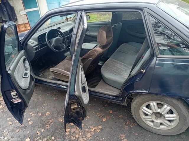Синій Деу Нексія, об'ємом двигуна 1.5 л та пробігом 150 тис. км за 1191 $, фото 1 на Automoto.ua