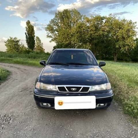 Синій Деу Нексія, об'ємом двигуна 6 л та пробігом 245 тис. км за 2100 $, фото 1 на Automoto.ua