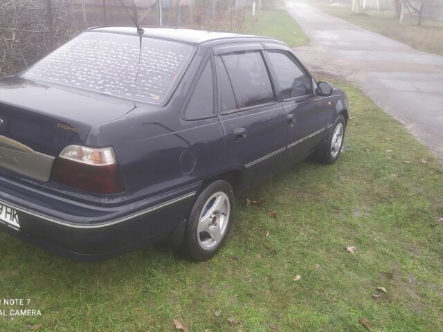 Синій Деу Нексія, об'ємом двигуна 1.5 л та пробігом 206 тис. км за 1800 $, фото 1 на Automoto.ua