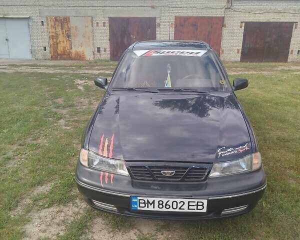Синій Деу Нексія, об'ємом двигуна 1.5 л та пробігом 240 тис. км за 1500 $, фото 1 на Automoto.ua
