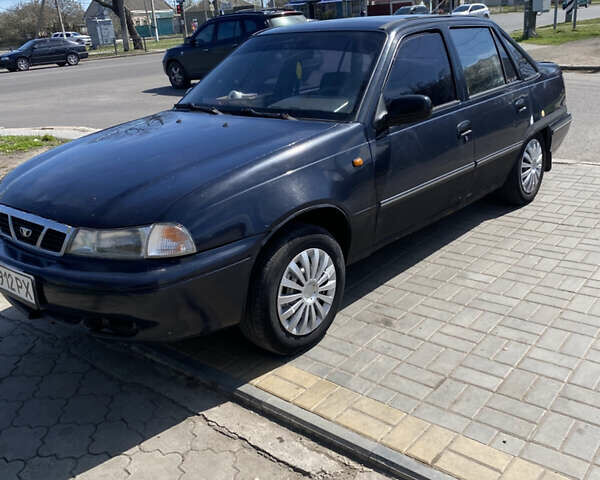Синій Деу Нексія, об'ємом двигуна 1.5 л та пробігом 290 тис. км за 1800 $, фото 1 на Automoto.ua