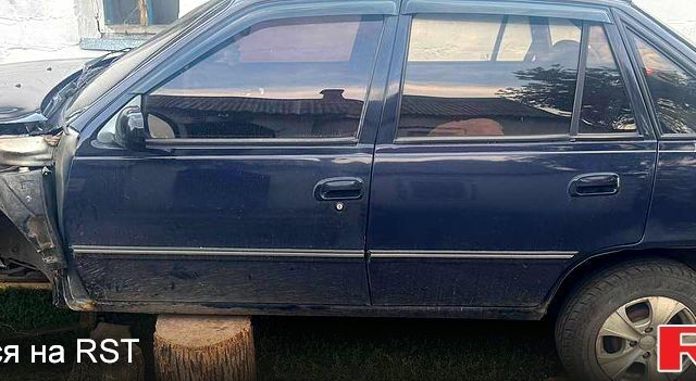 Синій Деу Нексія, об'ємом двигуна 1.5 л та пробігом 200 тис. км за 1500 $, фото 1 на Automoto.ua