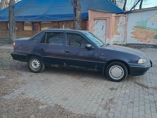 Синій Деу Нексія, об'ємом двигуна 1.5 л та пробігом 200 тис. км за 1000 $, фото 1 на Automoto.ua