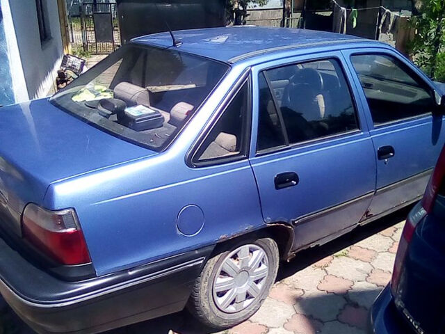 Синій Деу Нексія, об'ємом двигуна 1.5 л та пробігом 128 тис. км за 1700 $, фото 1 на Automoto.ua