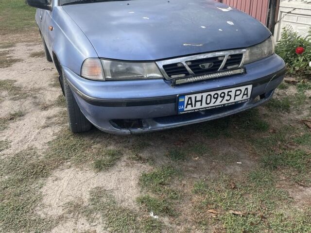 Синий Дэу Нексия, объемом двигателя 1.5 л и пробегом 250 тыс. км за 600 $, фото 1 на Automoto.ua