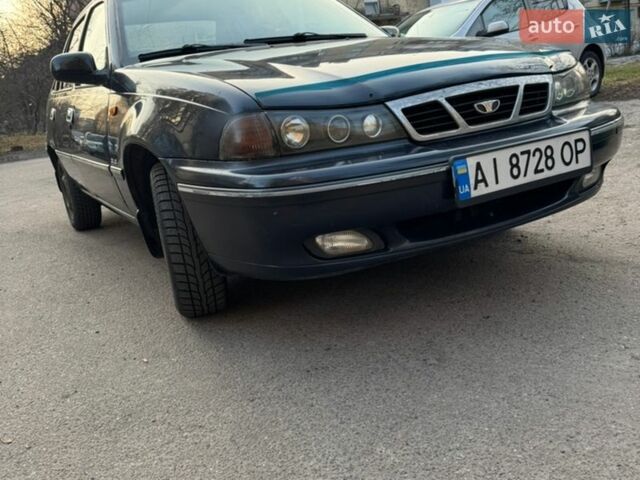 Синій Деу Нексія, об'ємом двигуна 1.5 л та пробігом 182 тис. км за 1350 $, фото 1 на Automoto.ua