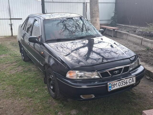Синій Деу Нексія, об'ємом двигуна 1.5 л та пробігом 172 тис. км за 2000 $, фото 1 на Automoto.ua